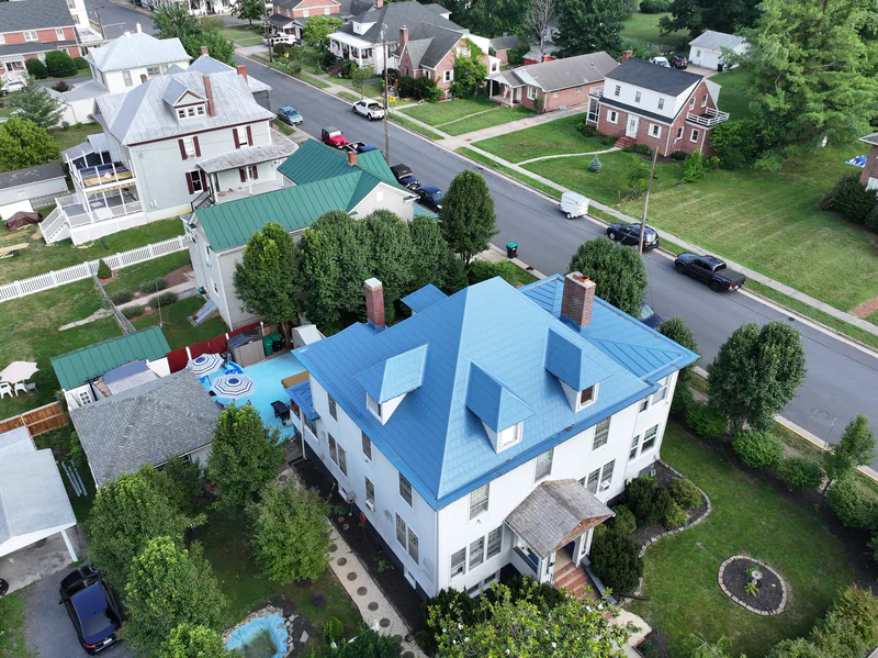 Aerial view from the opposite side of the completed blue metal shingle roof in Strasburg, Virginia