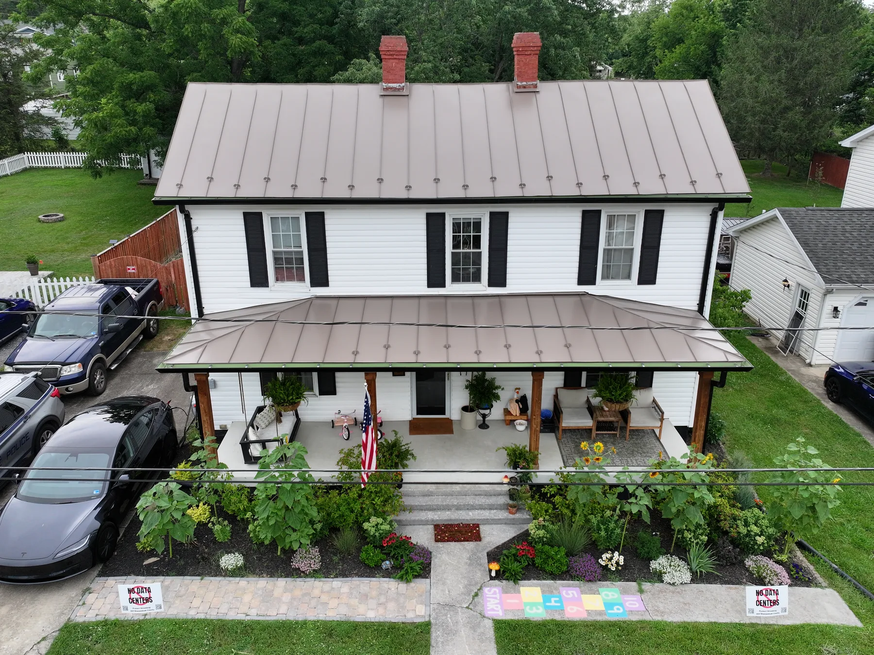 Completed standing seam metal roof and new siding on a Woodstock, Virginia home