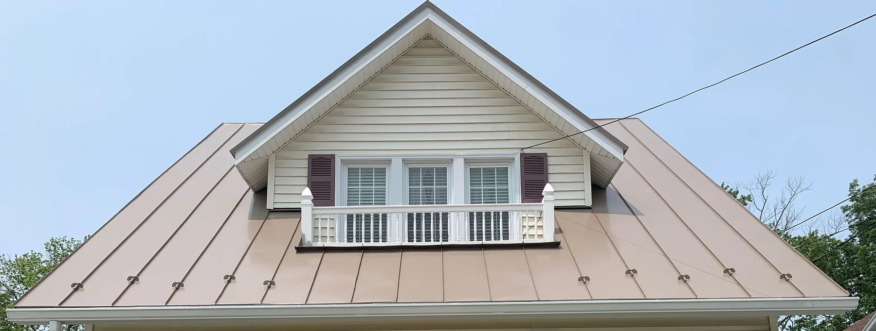 Front roofline of a completed standing seam metal roof in Harrisonburg, Virginia